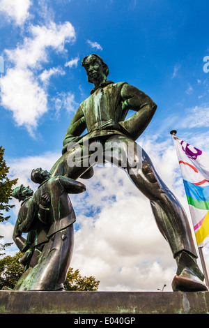 The statue of the mythical giant, Lange Wapper, outside the Het Steen or Stone Castle, in Antwerp, Belgium. Stock Photo