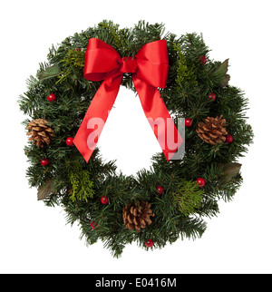 Holiday Wreath with Pine Cones and Red Ribbon Isolated on White Background. Stock Photo