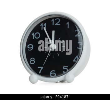 Black and White Clock almost at 12 O'clock. Isolated on White Background. Stock Photo