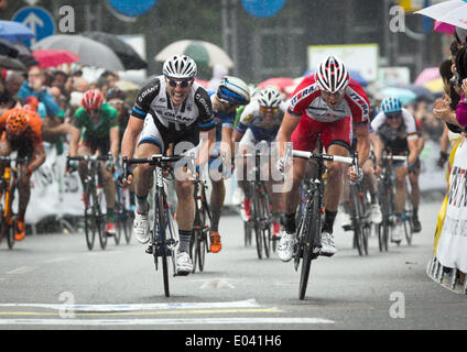 Germany's John Degenkolb (L) and Norway's Alexander Kristoff (R) cross the finish line during the Eschborn-Frankfurt City Loop in Frankfurt/Main, Germany, 01 May 2014. 21 teams with 168 cyclists are taking part in the 53rd edition of the cycling race on the 200 kilometer loop. Photo: FRANK RUMPENHORST/dpa Stock Photo