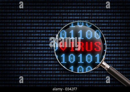 Magnifying Glass scanning and identifying a computer virus. Stock Photo