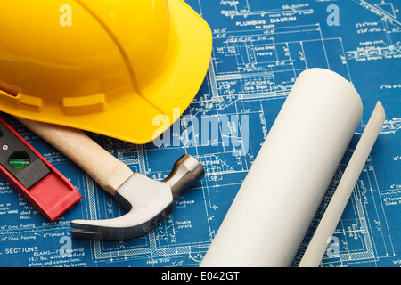 Blueprints and Construction Tools with Hard Hat. Stock Photo