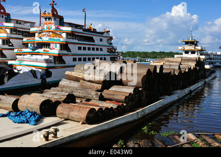 Wood transport - Port of Punchana in IQUITOS . Department of Loreto .PERU Stock Photo