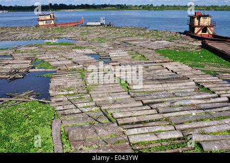 Wood transport - Port of Punchana in IQUITOS . Department of Loreto .PERU Stock Photo