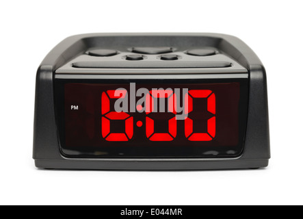 Black Plastic Alarm Clock With Red Display Isolated on White Background. Stock Photo