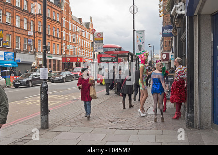 Extravagantly dressed young people outside the Black Cap pub in Camden Town, London. Stock Photo