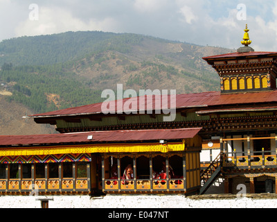 Bhutan Paro Festival Tsechu monks watching from doorway Stock Photo - Alamy