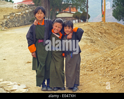 Three Bhutanese school children in Paro Stock Photo