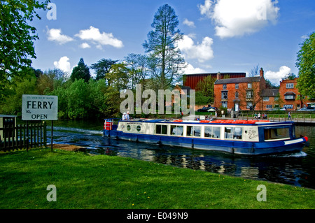 Pleasure trip boat on the River Avon in Stratford upon Avon, passing the site of the chain ferry crossing. Stock Photo