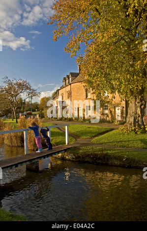 Cotswold village of Lower Slaughter with the River Eye, Gloucestershire. Stock Photo