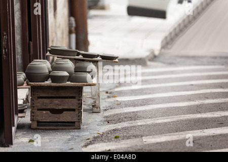 some crockery arranged on the street in a typical italian artisan shop Stock Photo