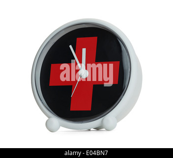 Clock with Red Medical Cross Isolated on White Background. Stock Photo