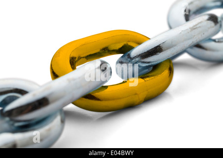 Chain held together with a gold link isolated on a white background. Stock Photo