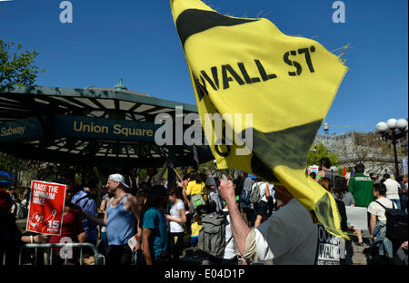 New York, USA. 1st May, 2014. Protestors from Occupy Wall Street and other organizations hold a protest demanding better payment and more immigration rights on May Day in Manhattan, New York, the United States, May 1, 2014. Credit:  Wang Lei/Xinhua/Alamy Live News Stock Photo
