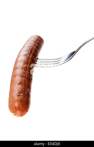 a delicious sausage on a fork over white Stock Photo