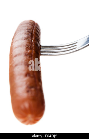 a delicious sausage on a fork over white Stock Photo