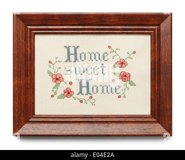 Cross Stitch in Wood Frame Isolated on White Background. Stock Photo