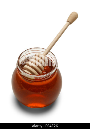 Glass Jar of Honey with Stir Stick Isolated on White Background. Stock Photo