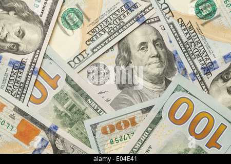New One Hundred Dollar Bills in Scattered Pile Laying Flat. Stock Photo