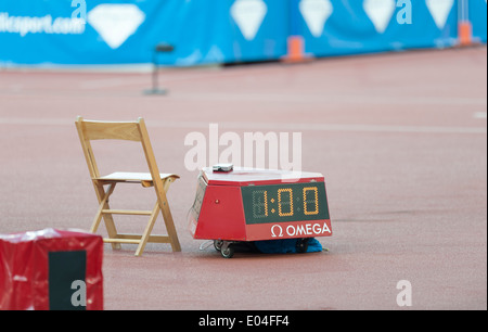 Empty referee's chair and timetaking equipment next to the track at Zurich (Switzerland) Letzigrund athletics stadium Stock Photo