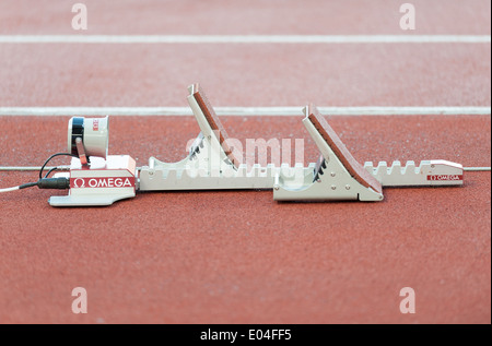 Starting block with integrated chronometry sensor on a running race track in Zurich (Switzerland) Letzigrund stadium Stock Photo