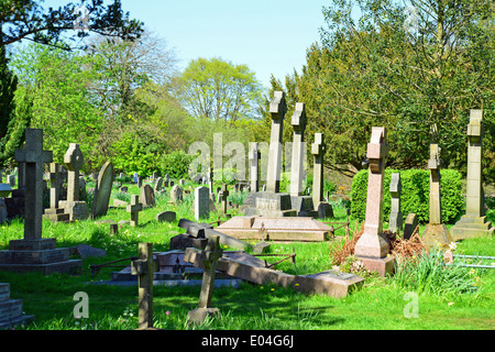 Ancient headstones in churchyard of The Parish Church of St Giles, Ashtead, Surrey, England, United Kingdom Stock Photo