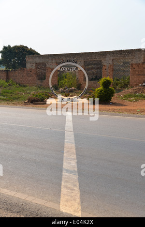 equator sign on the road at uganda, africa Stock Photo