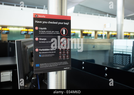 London Heathrow airport terminal 2 Have You Checked Your Bag sign Stock Photo