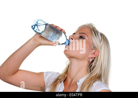 Woman with thirst and drinks mineral water from Petflasche., Frau mit Durst und trinkt Mineralswasser aus Petflasche. Stock Photo