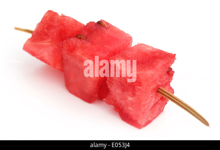 Piece of watermelon in a thorn over white background Stock Photo