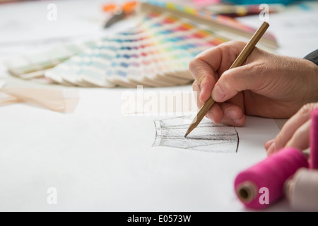 fashion designers, working in progress on tailor table Stock Photo