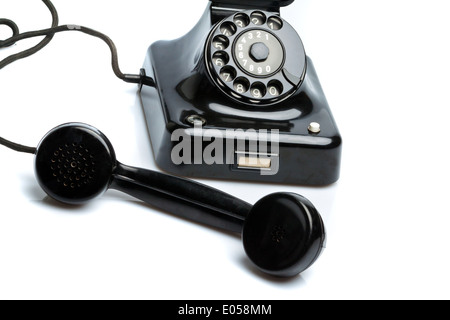 An antique, old fixed network telephone. Phone on white background., Ein antikes, altes Festnetz Telephon. Telefon auf weissem H Stock Photo
