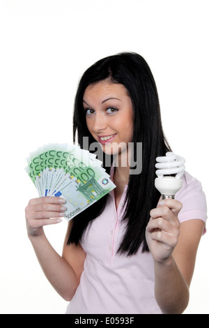 Woman with energy savings lamp. Energy lamp and euro of money, Frau mit Energie Sparlampe. Energielampe und Euro Geld Stock Photo