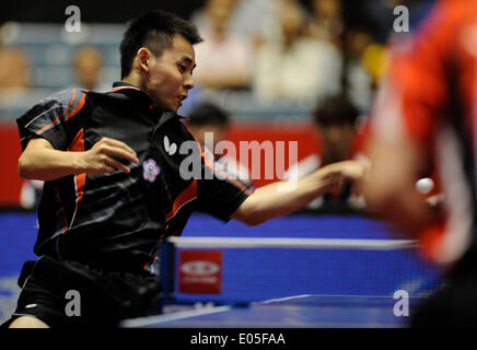 Tokyo, Japan. 3rd May, 2014. Chen Chien-An of Chinese Taipei plays against Joo Saehyuk of South Korea during the men's team quarterfinal match in Zen Noh 2014 World Table Tennis Championships in Tokyo, Japan, May 3, 2014. Chinese Taipei won 3-2. © Stringer/Xinhua/Alamy Live News Stock Photo