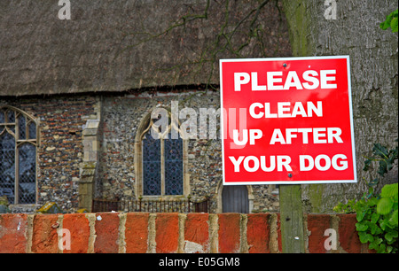 Clean up after your dog sign by Stokesby Church, Norfolk, England, United Kingdom. Stock Photo