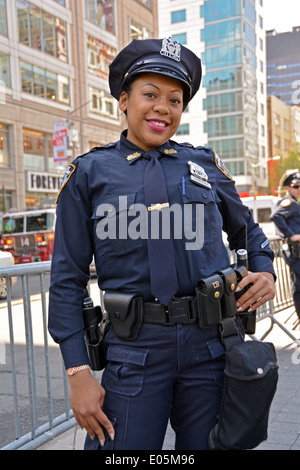 Portrait of a female New York City police officer at the May Day Rally in Union Square Park in Manhattan, New York City. Stock Photo