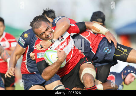 Michael Leitch of Japan is tackled by Justin Coveney of the Philippines during their Rugby World Cup qualifying match in Silangan, Laguna on May 3, 2014. Japan won against the Philippines, 99-10. (Photo by Mark Fredesjed R. Cristino / Pacific Press) Stock Photo