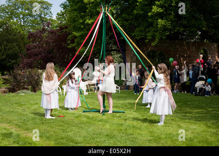 Orpington, Kent, UK. 3rd May 2014.  Maypole dancing during the May Queen celebrations which took place in Priory Gardens Orpington Credit:  Keith Larby/Alamy Live News Stock Photo