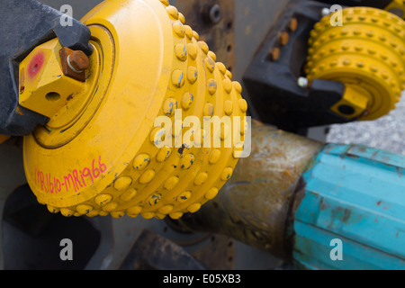 A drill bit waits to be used during the drilling of a large diameter raisebore mining shaft. Stock Photo