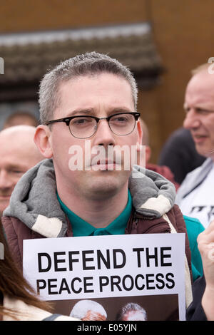 Divis Street, Belfast, Northern Ireland, UK. 3rd May 2014. Niall Ó Donnghaile at the new mural on Divis Street, Belfast, against the continuing detention of Mr Adams Credit:  Bonzo/Alamy Live News Stock Photo