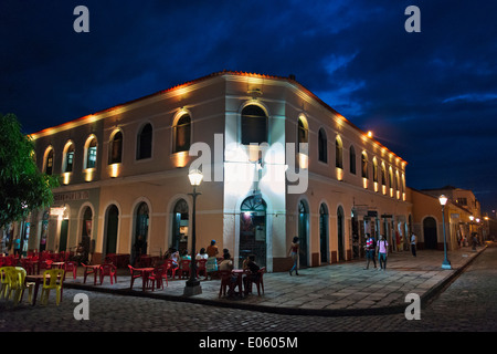 Building and cobbled street in historic center of Sao Luis (UNESCO World Heritage site) at night, Maranhao State, Brazil Stock Photo