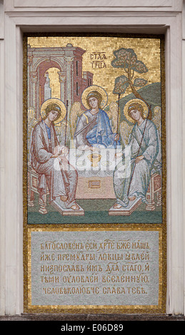 Icon of The Old Testament trinity on wall Holy Trinity Cathedral of the Alexander Nevsky Monastery, St.Petersburg, Russia Stock Photo