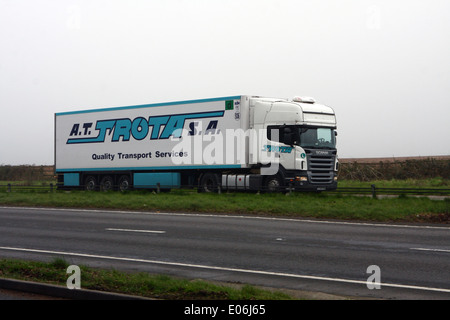 An AT Trota truck traveling along the A417 dual carriageway in The Cotswolds, England Stock Photo