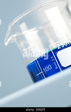 Glass beaker filled with 150ml of blue solution Stock Photo