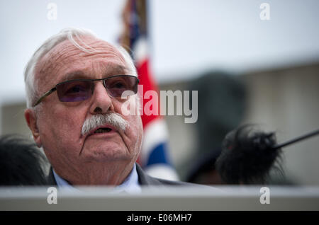 Oranienburg, Germany. 04th May, 2014. Roger Bordage, President of the International Sachsenhausen Committee, gives a speech during the ceremony to mark the 69th anniversary of the liberation of Sachsenhausen and Ravensbrueck concentration camps at Station Z in Oranienburg, Germany, 04 May 2014. The pupils want to turn a former prisoner of war camp into a memorial. The 69th anniversary of the liberation is celebrated on 04 May 2014. Photo: DANIEL NAUPOLD/dpa/Alamy Live News Stock Photo