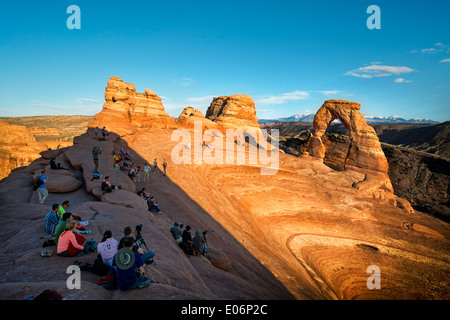 People waiting for the sunset at Delicate Arch, Arches National Park, Utah, USA Stock Photo