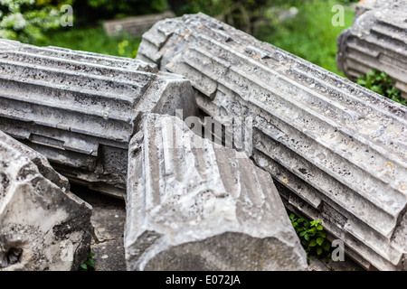 some broken and ancient roman columns ruins Stock Photo