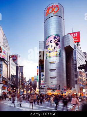 License available at MaximImages.com - People crossing the street in front of Shibuya 109 store in Tokyo, Japan