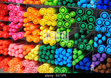 Colorful markers, highlighters on display in a store, abstract background Stock Photo