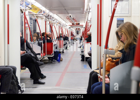 People riding TTC subway train in Toronto, Canada. Stock Photo